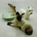 A Beswick trout dish, a Beswick West Highland Terrier and a Royal Doulton Siamese cat