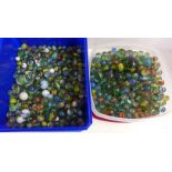 Two tubs of marbles**PLEASE NOTE THIS LOT IS NOT ELIGIBLE FOR POSTING AND PACKING**