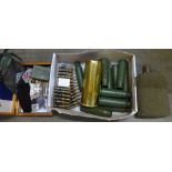 A box of military shell cases and other militaria