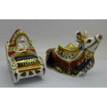 Two festive Royal Crown Derby paperweights Santa and Sleigh and Reindeer, both with gold stoppers,