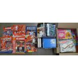 A box of Giles annuals, Garfield, etc., a box of Wizard and Sorcery books, Arsenal books, etc.**