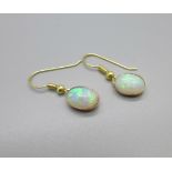 A pair of 18ct gold and opal earrings