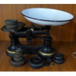 A set of kitchen scales and weights