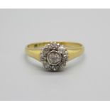 An early 20th Century 18ct gold and diamond cluster ring, 3.4g, U