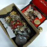 A box of costume jewellery, mainly earrings