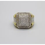 A 10K gold and diamond ring, 10.4g, U, 17mm wide