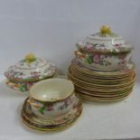 A Royal Doulton Temple part dinner service comprising a pair of tureens, ten dinner plates, six