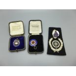 Two silver fobs and a RAOC badge