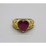 A silver gilt, heart shape ruby solitaire ring, P