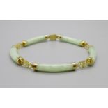 A 14ct gold and jade bracelet