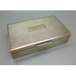 A silver cigarette box, total weight 408g, width 14cm