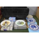 A collection of boxed Wedgwood collectors plates, napkin rings and a box of Wedgwood teabags