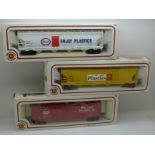 Three Bachmann HO gauge rolling stock, Center Flow Hopper x2 and 51' Plug Door Box Car, all boxed
