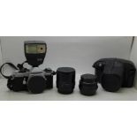 A Pentax ME Super camera body, f1.7 50mm lens, case, Pentax AF 2160 flash, Vivitar tele converter