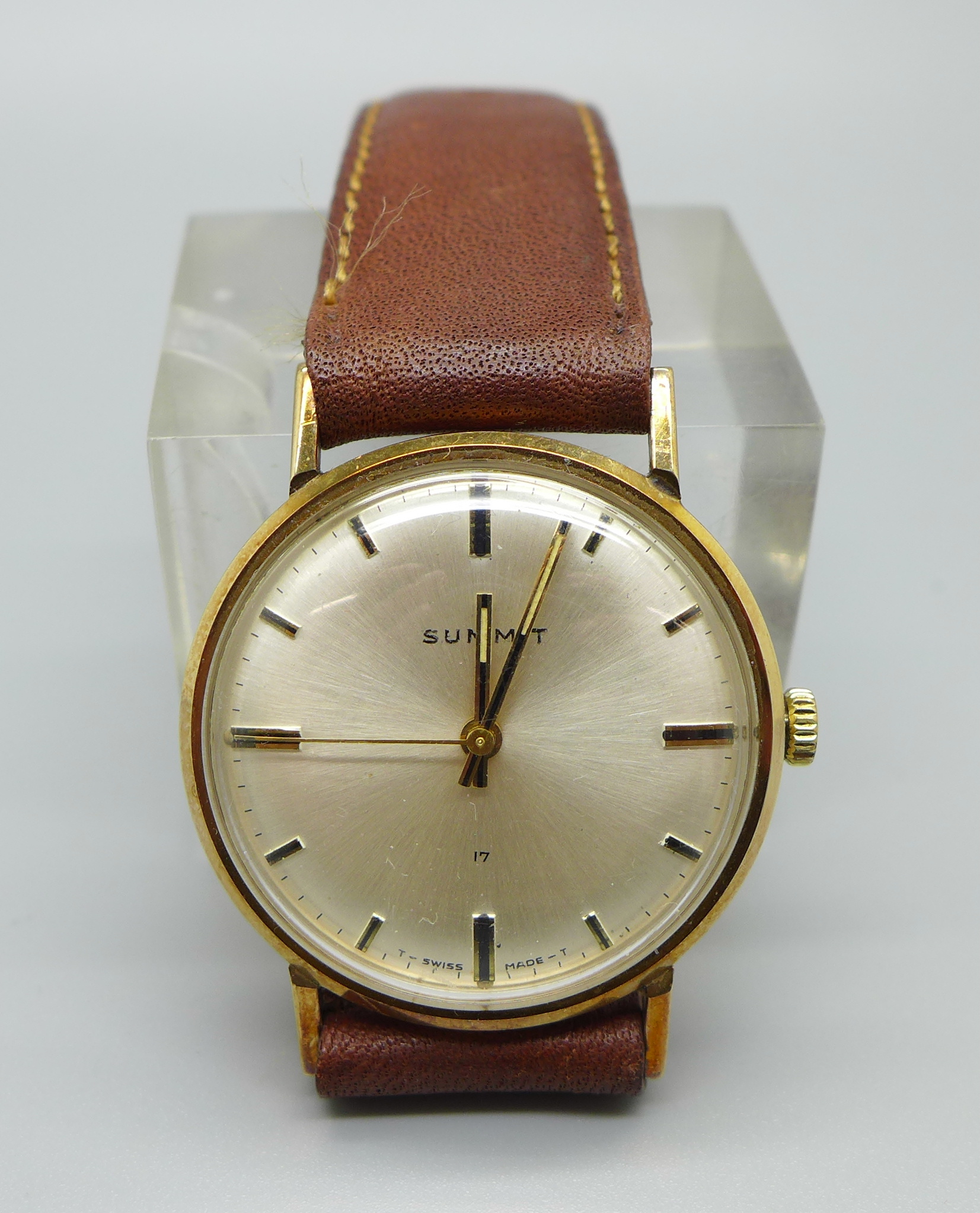 A gentleman's 9ct gold Summit wristwatch, the case back bears faint Barton Transport inscription