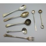 Six silver condiment spoons, four hallmarked and two test as silver, and a silver olive fork