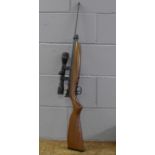 A Crosman CO² cylinder 2260 air rifle with scope, .22 calibre, (scope Nikko Stirling 4 x 32 A?)