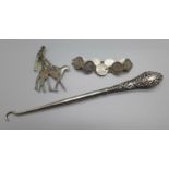 A 925 silver brooch, a silver handled button hook and an Australian coin bracelet