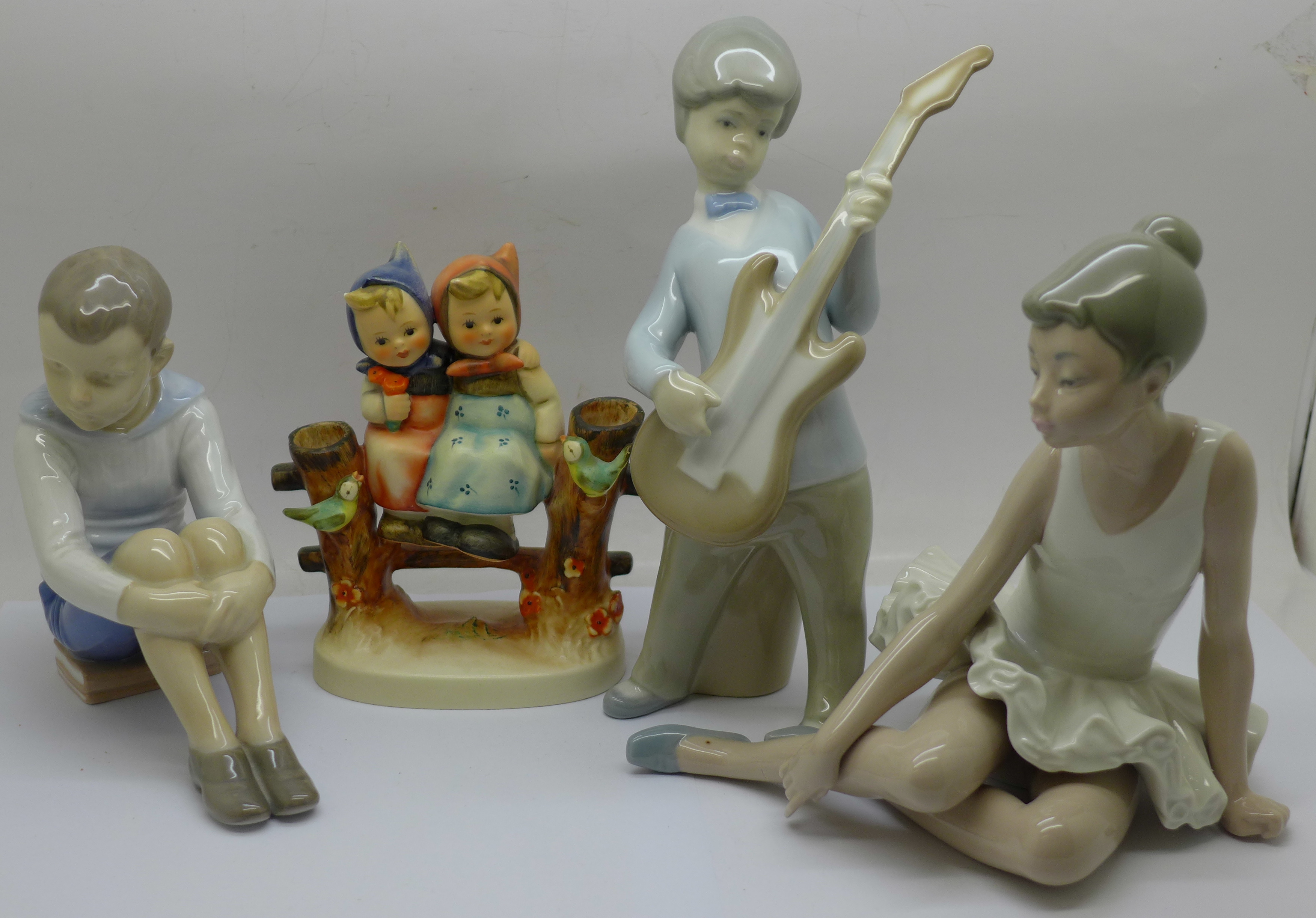 Four figures, B&G Denmark, Lladro, Nao and Hummel, Hummel figure a/f (small chip on one head)