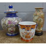Three pieces of oriental pottery; vase, planter and lidded vase