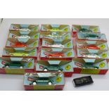 Sixteen HO scale Tri-ang Minix vehicles in gold token boxes