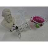 A Parian bust of John Ruskin, a Beswick model Dalmatian, a/f, a glass dolphin and a coloured glass
