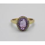 A 9ct gold, amethyst and diamond cluster ring, 1.8g, M