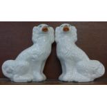 A pair of Staffordshire spaniels, 32cm