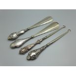 Silver handled button hooks and shoe horns, (2+2)