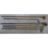 Five hickory shafted golf clubs and one other