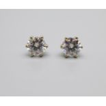 A pair of 18ct white gold and moissanite ear studs
