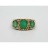 A 9ct gold, emerald and diamond ring, 2.2g, P