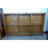 An early 20th Century satinwood open bookcase