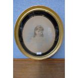 Edith Scamell (1852-1940), oval pencil and pastel study of a young girl, dated 1908, framed