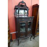 A Victorian walnut bow front side cabinet
