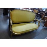 A French Louis XV style gilt wood and fabric upholstered canape sofa