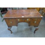 A Victorian inlaid walnut kneehole desk