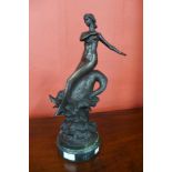 A bronze figure of a female nude, on marble socle