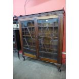 An Edward VII walnut two door bookcase