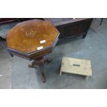 A Victorian inlaid mahogany trumpet shaped sewing table and a pine milking stool