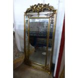 A large gilt French style gilt framed mirror with crest, 183 x 90cms (M32168) #