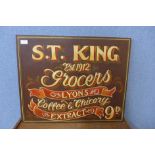 A hand painted wooden sign, S. T. King, Grocers