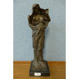 A bronze figure of a veiled semi nude female on marble base