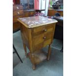 A 19th century French walnut and marble table de nuit