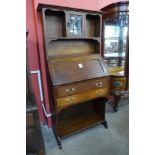 An Arts and Crafts oak bureau bookcase