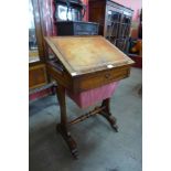 A Victorian mahogany and leather topped sewing table