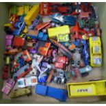 A box of die-cast vehicles, playworn