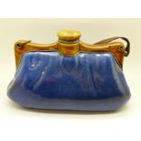 A Bourne Denby hot water bottle in the form of a bag, width 24cm