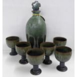 A Woburn Pottery decanter and six goblets **PLEASE NOTE THIS LOT IS NOT ELIGIBLE FOR POSTING AND