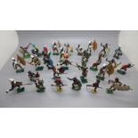 A collection of metal Zulu warrior figures